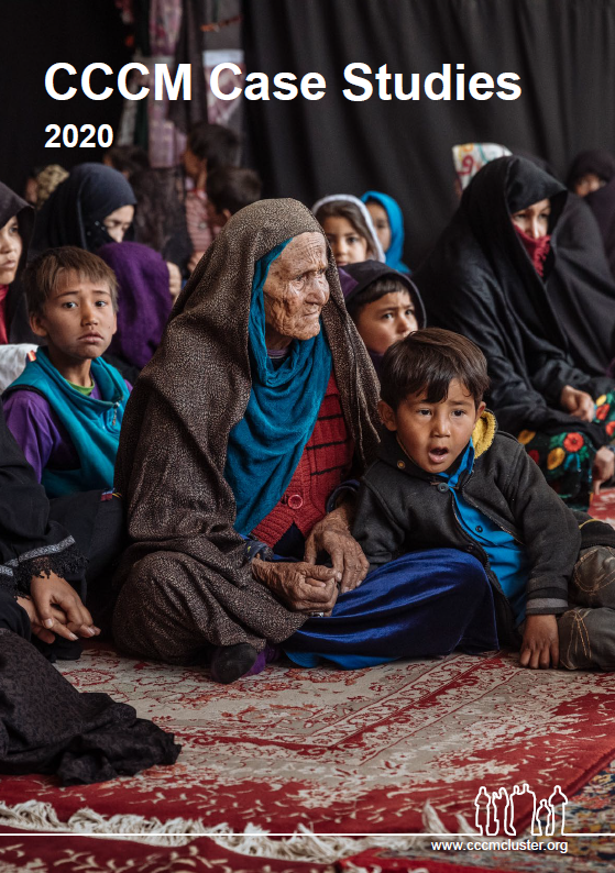 Photo of elderly woman with younger children in a IDP camp in Afganistan